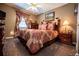 Bedroom with comfortable carpet, stylish bed, and matching decor throughout the room at 84 Ledbetter Rd, Villa Rica, GA 30180