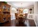 Formal dining room with traditional wooden furniture and chandelier at 84 Ledbetter Rd, Villa Rica, GA 30180