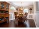 Elegant dining room features a chandelier, wood table, and decorative molding at 84 Ledbetter Rd, Villa Rica, GA 30180
