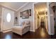 Elegant foyer with dark wood floors, light walls, and decorative accents at 84 Ledbetter Rd, Villa Rica, GA 30180