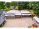 Aerial shot of a large garage with multiple bays and an expansive concrete driveway at 84 Ledbetter Rd, Villa Rica, GA 30180