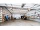 Vast garage interior with ample space for storage, trailer, and a golf cart at 84 Ledbetter Rd, Villa Rica, GA 30180