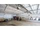 Spacious garage interior with high ceilings, ample room for storage, and a golf cart at 84 Ledbetter Rd, Villa Rica, GA 30180