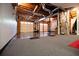 Spacious garage features dual doors, concrete floors and exposed ceiling at 84 Ledbetter Rd, Villa Rica, GA 30180
