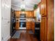 Functional kitchen with black appliances, wood cabinets, and coordinated decor at 84 Ledbetter Rd, Villa Rica, GA 30180