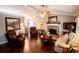 Inviting living room features hardwood floors, fireplace, and comfortable seating at 84 Ledbetter Rd, Villa Rica, GA 30180