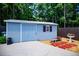 Backyard shed with a side yard and small patio area for decor at 84 Ledbetter Rd, Villa Rica, GA 30180