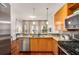 Modern kitchen with granite counters, stainless steel appliances, and a breakfast bar at 870 Inman Village Ne Pkwy # 305, Atlanta, GA 30307