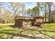 Home exterior showing a private yard with a wooden deck, perfect for enjoying the outdoors at 2755 Austin Ln, Jonesboro, GA 30236