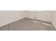Bright bedroom features soft gray carpet, window, and fresh neutral paint at 2755 Austin Ln, Jonesboro, GA 30236