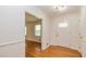 Inviting entryway with hardwood floors, offering a glimpse into the living area at 2755 Austin Ln, Jonesboro, GA 30236