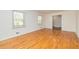 Bright living room with hardwood floors, windows, and natural light at 2755 Austin Ln, Jonesboro, GA 30236