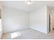 Bedroom with light-colored walls, carpet, and a window at 2959 Rambler Dr, Loganville, GA 30052