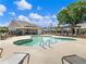 Community pool with sun loungers and outdoor seating in a well-maintained outdoor space at 2959 Rambler Dr, Loganville, GA 30052
