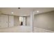 Spacious basement with neutral walls and carpet, featuring multiple doorways and recessed lighting at 5170 2Nd St, Morrow, GA 30260