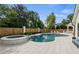 Inviting pool area with a spa, elegant patio and outdoor seating, perfect for entertaining at 9315 Prestwick Club Dr, Johns Creek, GA 30097