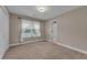 Cozy bedroom features a closet, carpet, and natural light at 1093 Third St, Stone Mountain, GA 30083