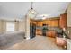 Open-concept kitchen and living area, featuring stainless steel appliances, a spacious island, and a seamless flow for entertaining at 1093 Third St, Stone Mountain, GA 30083