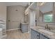 Bright main bathroom features double vanities, granite counters, and modern fixtures at 1093 Third St, Stone Mountain, GA 30083
