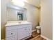 Clean bathroom features a modern vanity with storage and an illuminated mirror at 269 Moreland Way, Atlanta, GA 30354