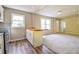 Open kitchen layout with stainless steel appliances and wooden breakfast bar at 269 Moreland Way, Atlanta, GA 30354