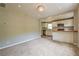 Cozy living space next to an updated kitchen featuring stylish finishes and ample natural light at 269 Moreland Way, Atlanta, GA 30354
