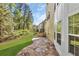 Beautiful backyard featuring a stone patio and lush greenery, great for outdoor gatherings at 3120 Abbey Sw Dr, Atlanta, GA 30331