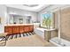 Spacious bathroom features a soaking tub, double vanity, and separate tiled shower at 3120 Abbey Sw Dr, Atlanta, GA 30331