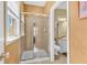 Bathroom with a window and glass-enclosed shower at 3120 Abbey Sw Dr, Atlanta, GA 30331