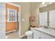 Bathroom featuring a white vanity, toilet and walk-in shower at 3120 Abbey Sw Dr, Atlanta, GA 30331