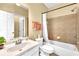 Well-lit bathroom with a tiled shower-tub combination and ample vanity space at 3120 Abbey Sw Dr, Atlanta, GA 30331