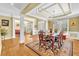 Spacious dining room with hardwood floors, large windows, and ample natural light at 3120 Abbey Sw Dr, Atlanta, GA 30331