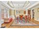 Elegant dining room featuring decorative ceiling, hardwood floors, and classic furnishings at 3120 Abbey Sw Dr, Atlanta, GA 30331