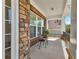 Charming porch with brick columns provides a relaxing space for outdoor seating and enjoyment at 3120 Abbey Sw Dr, Atlanta, GA 30331
