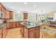 Gourmet kitchen featuring an island, stainless steel appliances, and an eat-in area at 3120 Abbey Sw Dr, Atlanta, GA 30331