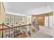 View of the living room from the landing overlooking the downstairs living space at 3120 Abbey Sw Dr, Atlanta, GA 30331