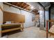 Unfinished basement with storage space and utility hookups at 6141 Windsong Way, Smoke Rise, GA 30087