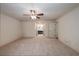 Bedroom with neutral carpet, large size, and access to the ensuite bathroom at 6141 Windsong Way, Smoke Rise, GA 30087