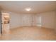 This room has tiled floors, doorways, and lighting, which creates a bright and open feel at 6141 Windsong Way, Smoke Rise, GA 30087