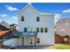 Spacious two-story home with backyard patio and deck, perfect for entertaining and outdoor enjoyment at 327 Morning Frost, Canton, GA 30114