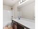 Bathroom with a marble countertop, vanity, and a shower with a tub at 327 Morning Frost, Canton, GA 30114