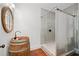 A unique bathroom with modern fixtures, rustic finishes and standing shower at 327 Morning Frost, Canton, GA 30114
