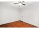 A bright and spacious bedroom with hardwood floors and ceiling fan at 327 Morning Frost, Canton, GA 30114