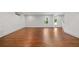 Spacious living room with hardwood floors and white walls at 327 Morning Frost, Canton, GA 30114