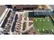 Aerial of outdoor game area near patio featuring game of cornhole and rooftop bar/lounge with outdoor seating at 4915 Bergen Ct, Cumming, GA 30040