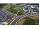 Aerial view of a community center showcasing its architecture, streetscape, and surrounding landscape at 4915 Bergen Ct, Cumming, GA 30040