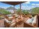 Outdoor deck offering ample seating and a peaceful view, creating an ideal relaxation space at 4915 Bergen Ct, Cumming, GA 30040