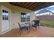 Outdoor patio with a table, chairs, and grill, ideal for enjoying outdoor meals and entertaining at 4915 Bergen Ct, Cumming, GA 30040