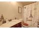 Cozy bathroom with paris themed shower curtain and cabinet sink at 5280 Clingman Ct, Douglasville, GA 30135