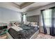 Comfortable bedroom featuring grey walls and large bed at 5280 Clingman Ct, Douglasville, GA 30135